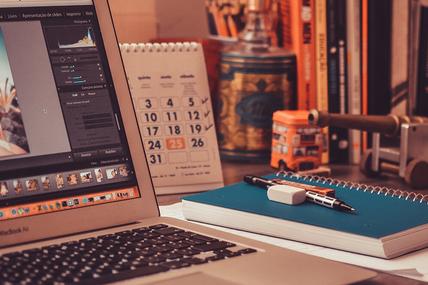 A freelancer's desk setup, representing an independent professional planning to get an Oman freelance visa by setting up a business.